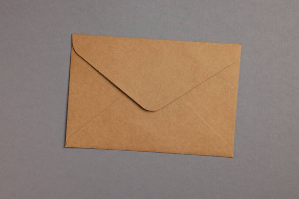 istock Envelope made of parchment paper on grey background, top view 1940579260