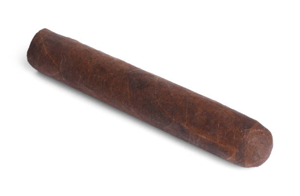 istock Cigar wrapped in tobacco leaf isolated on white 1940580902