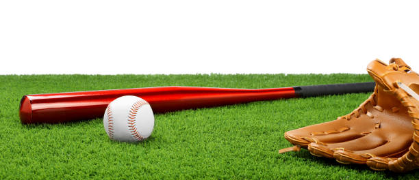 istock Baseball bat, ball and catcher's mitt on artificial grass against white background 1940626991