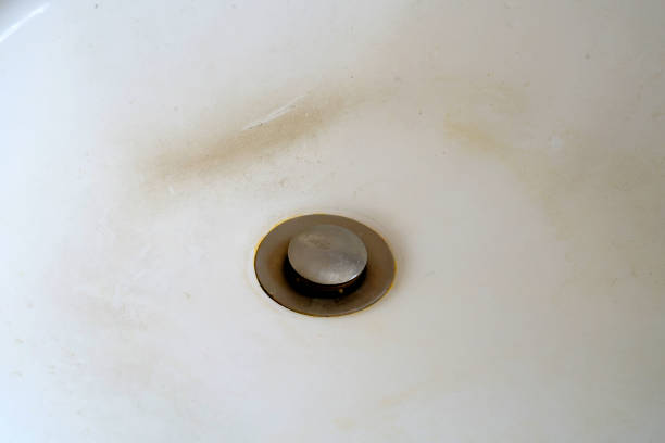 istock close up on dirty water sink in bathroom 1940634866