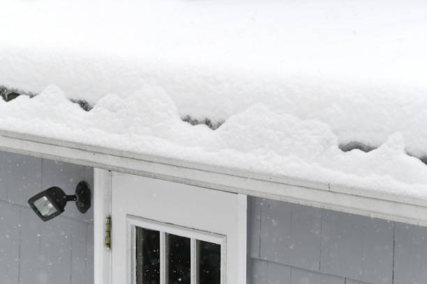 istock close up on snow covered roof 1940640088