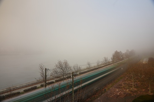 Budapest, Hungary - December 20, 2023: Long exposed shot of train in Foggy day.