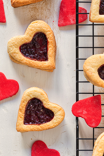 Heart shaped cookies with strawberry jam, Valentine's Day concept