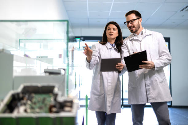 istock Quality control experts checking new products inside the factory exhibition room. 1940723196