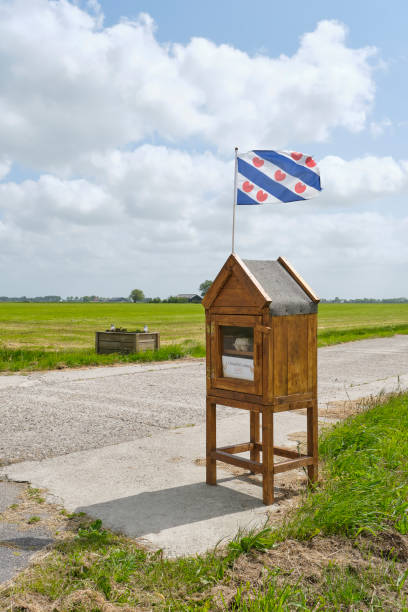 Cabinet with Frisian flag and free-range eggs at a farm