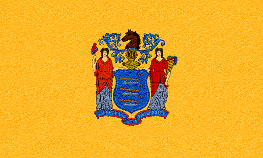 Flag of New Jersey state USA on a textured background. Concept collage.