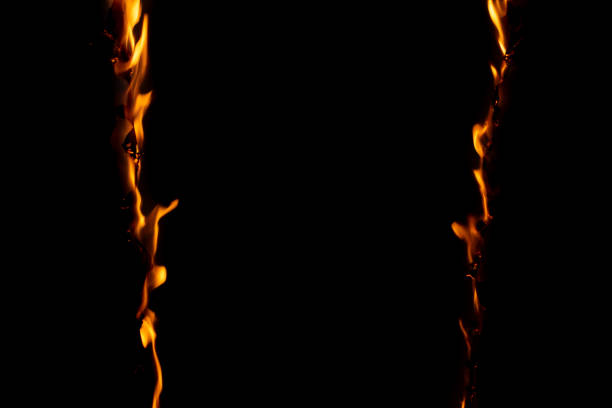 burning paper, glowing edge of paper on a black background