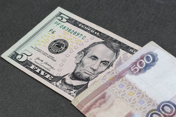 istock View of russian rubles and US dollars banknotes. 1940787918
