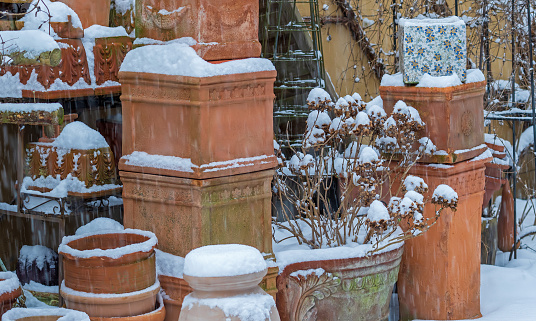 January 2024:: Decorative Garden elements covered with snow