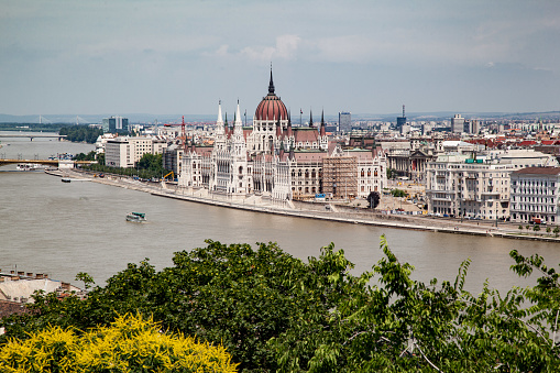 The Hungarian Parliament Building at the shore of the Danube River in Budapest, Hungary