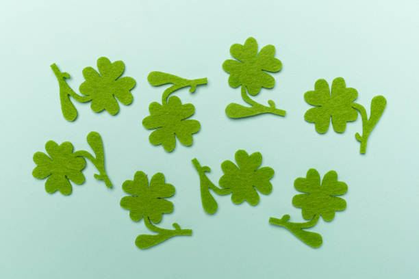 istock Felt clover on color background, top view. St. Patricks day concept 1940916475