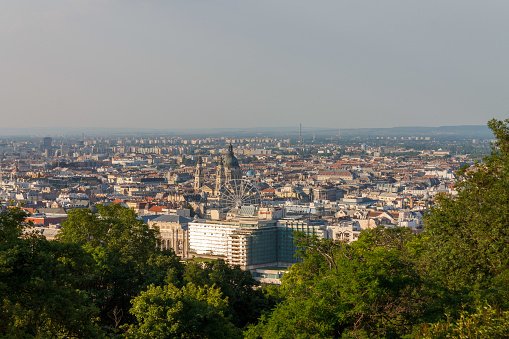 Picture of he landscape of Lyon, France, from above, on the Fourviere hill during a sunny afternoon. The major Lyon skyscraper, Le Crayon is visible. Also called the Tour Part-Dieu, or Tour du Credit Lyonnais, it  is a major high rise in Lyon, France.