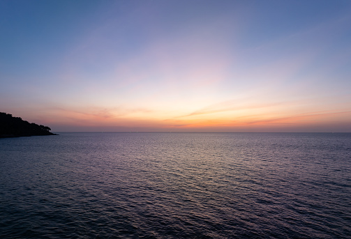 Landscape Sunset sky,Nature beautiful Light Sunset or sunrise over sea,Colorful dramatic majestic scenery sunset Sky with Amazing clouds and waves in sunset sky,Nature light cloud background