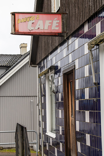 Billinge, Sweden Dec 22, 2024 An old antique sign over a closed bakeshop and cafe.