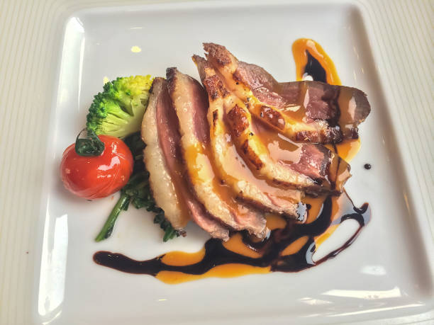 Duck breast with cointreau and orange reduction