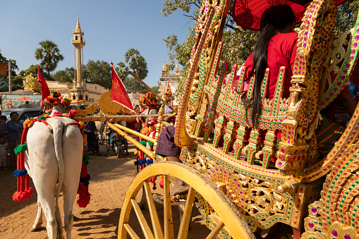 Bagan, Myanmar - 25 Dec, 2019: Decorated carriages with golden motifs, during the Shinbyu, a novitiation ceremony, in the tradition of Theravada Buddhism