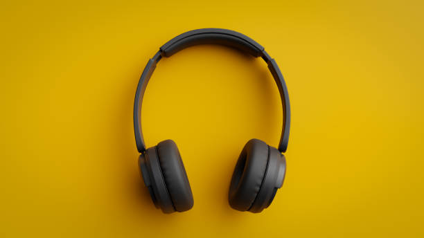 istock Black wireless headphones on yellow background,3d rendering 1941171812