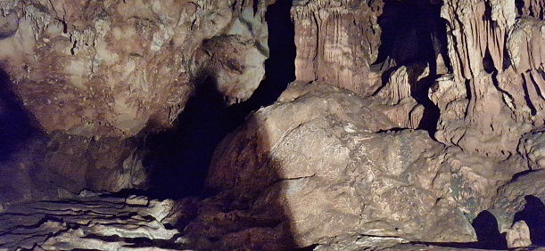 Stalactites and stalagmites inside the cave.