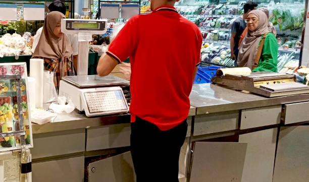istock Digital weighing scale in supermarket. 1941245219