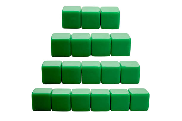 Closeup view of a row of small cubes isolated over a white background