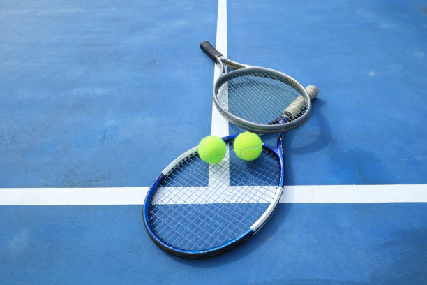 istock Close up view tennis ball with racket 1941312361