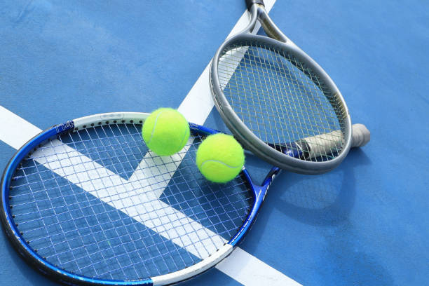 istock Close up view tennis ball with racket 1941312367