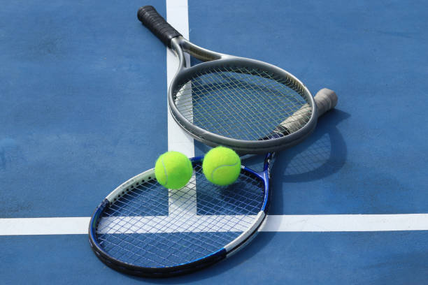 istock Close up view tennis ball with racket 1941317052