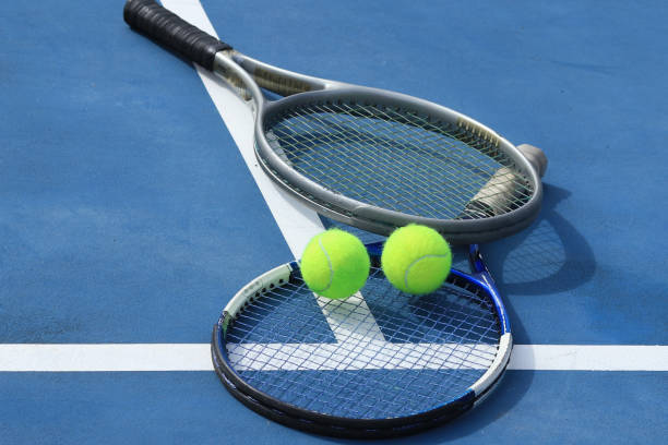 istock Close up view tennis ball with racket 1941317056