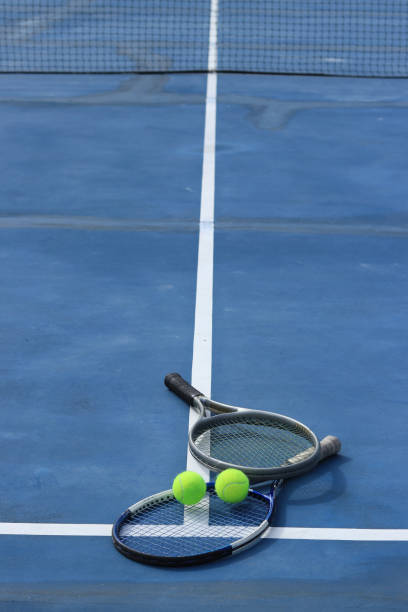 istock Close up view tennis ball with racket 1941317059