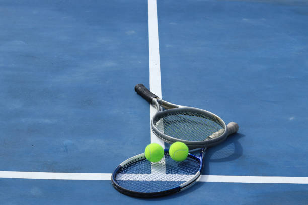 istock Close up view tennis ball with racket 1941318100