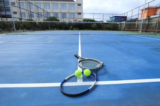 istock Close up view tennis ball with racket 1941320696