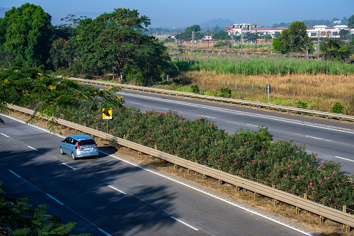 Pune, India - January 14 2024: Traffic on the Mumbai Pune Expressway near Pune India. The Expressway is officially called the Yashvantrao Chavan Expressway.