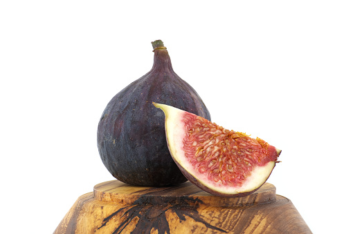 Ripe fresh fig fruits isolated on white background, full depth of field