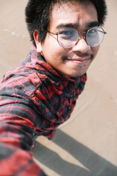 istock happy thai man at sea 1941383884