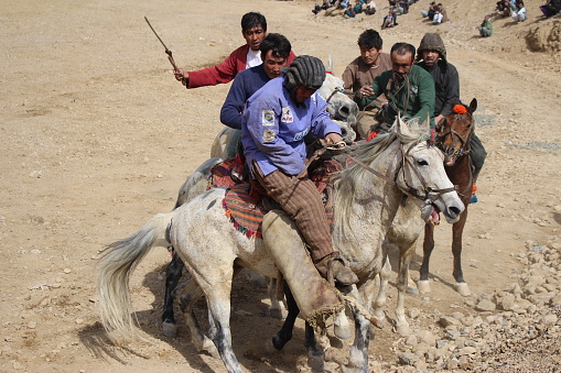 buzkashi  has remained as a legacy of the past among the tribes of northern Afghanistan since the time of the Scythians until recent decades. During the rule of the Taliban regime, goat slaughter in Afghanistan was regulated by this regime, because it was considered immoral due to playing with the carcass of a halal animal.