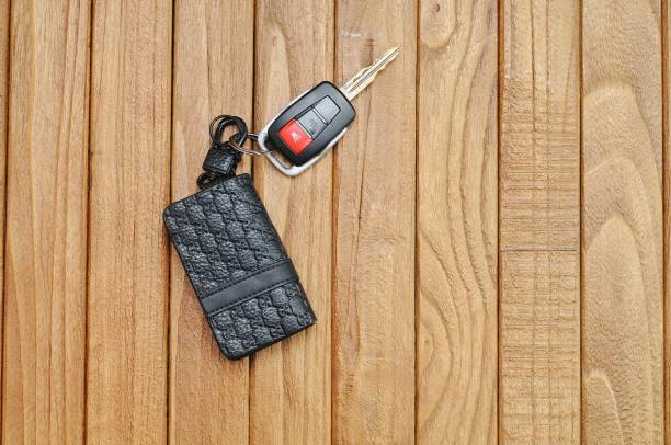 car keys on a wooden table