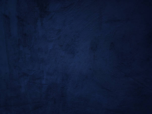 istock Dark rough cement wall background for graphic design 1941411341