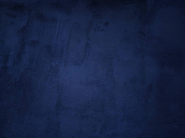 istock Dark rough cement wall background for graphic design 1941411342