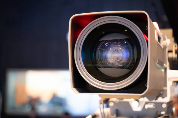 istock Professional television camera with large lens on a tripod during TV recording 1941414777