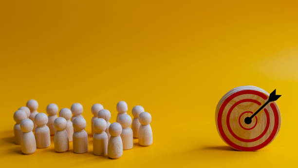 istock Concept of achieving goals by cooperating with team members with a human icon for customer focus target group and customer relation management concept. 1941469552