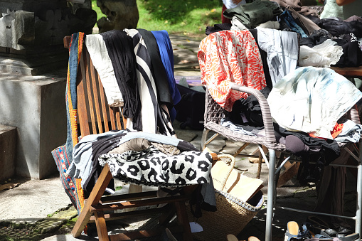 Close-up shot Piles of Pre-Loved Clothing At Flea Market