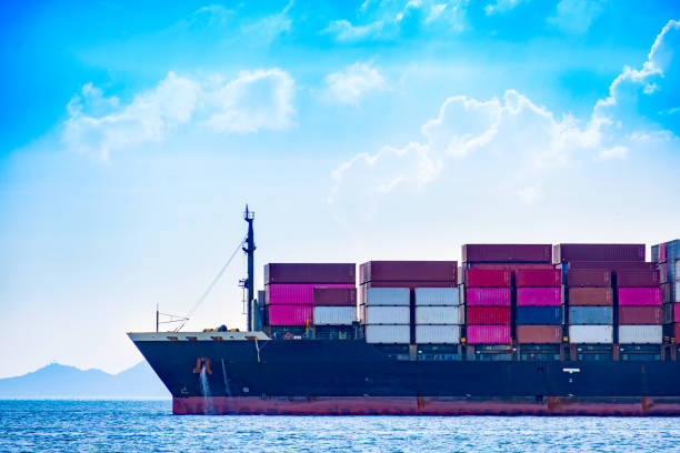 istock Shipping system by sea, shipping containers international transportation Export-import business, logistics, transportation industry concepts 1941588886