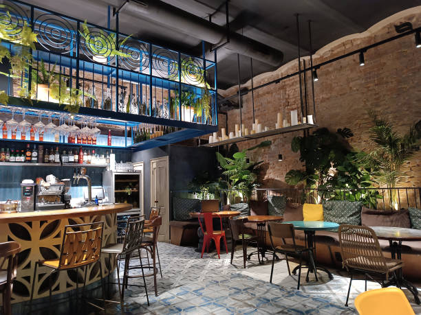 istock Interior of a modern cozy restaurant with fresh flowers and light interior 1941632336