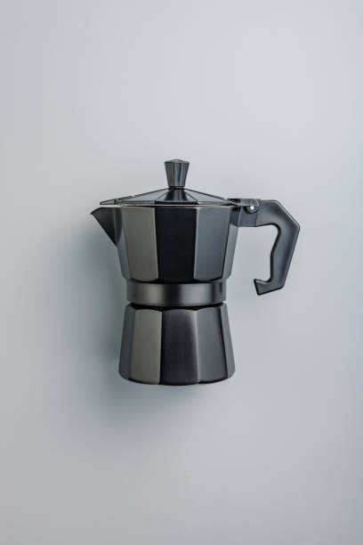 istock Bialetti moka pot. Coffee maker on gray background. 1941675155