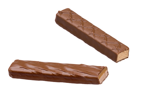 Tasty chocolate bar stick caramel isolated on the white background