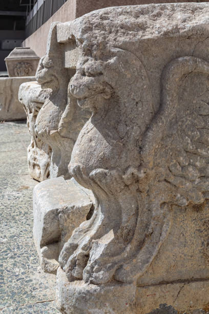 istock Ancient marble figures of gryphon. Close up, vertical. Izmir, Turkey 1941777171