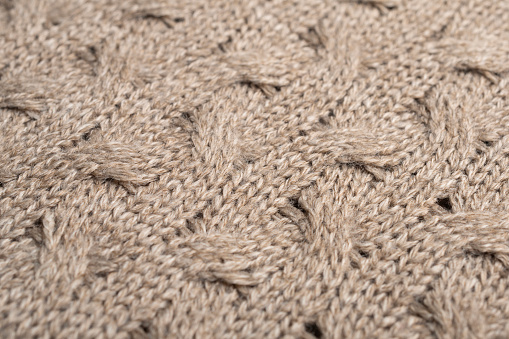 Detail of the woven workmanship of a handmade wool sweater