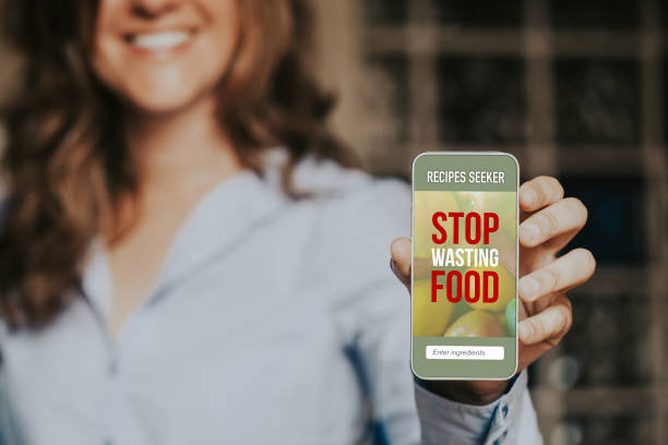istock Stop Wasting Food mobile phone app. 1941795499
