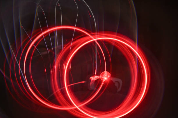 istock abstract background of red circles. glowing neon lines 1941812971