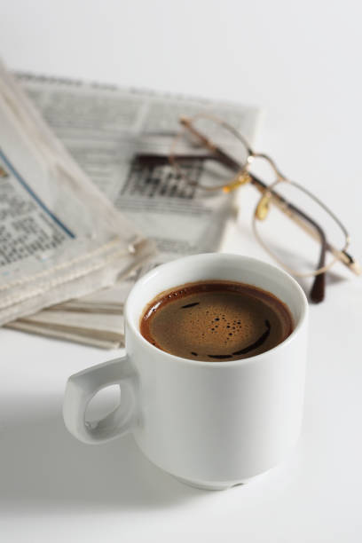 istock Coffee, newspaper and glasses 1941830031